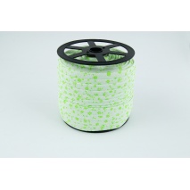 Cotton bias binding bright green meadow on a white background