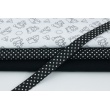 Cotton bias binding white dots on a black background