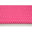 Cotton laminated 7mm dots on a fuchsia background