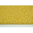 Double gauze 100% cotton white speckles on a mustard background