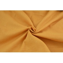 Double gauze 100% cotton gold dust on a dark honey background