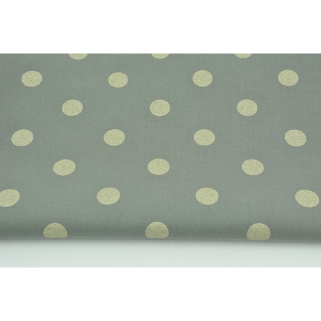 Cotton 100% dots 17mm light gold on a dark gray background