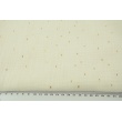 Double gauze 100% cotton golden marks on a creamy background