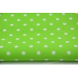 Cotton 100% white 2mm polka dots on a bright green background