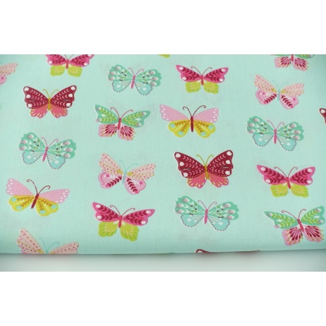 Cotton 100% Cotton 100% colorful butterflies on a mint background, poplin