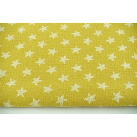 Double gauze 100% drawn stars on a mustard background