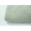 Quilted double gauze 100% cotton in stars on beige.