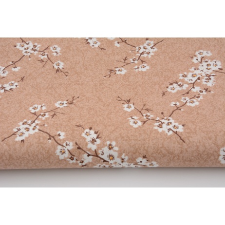 Cotton 100% twigs of blossoming cherry on a beige background