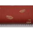 Double gauze 100% cotton golden feathers on a brick background