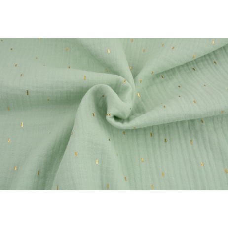 Double gauze 100% cotton golden marks on a mint background