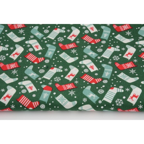 Cotton 100% Christmas socks on a green background, poplin