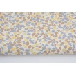 Cotton 100% brown-yellow pebbles on a creamy background