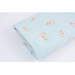 Flat double gauze, muslin 100% cotton roses on a blue background