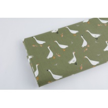 Cotton 100% geese on a green background