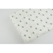 Double gauze 100% cotton green leaves on a white background GOTS
