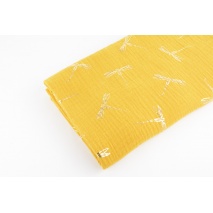 Double gauze 100% cotton golden dragonfly on a mustard background