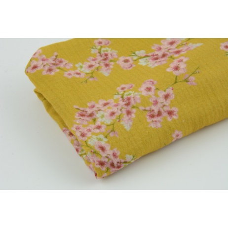 Double gauze 100% cotton cherry blossom on a mustard background