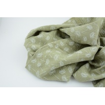 Double gauze 100% cotton puffballs on a light olive background