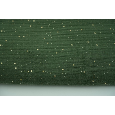 Double gauze 100% cotton golden confetti on a rotten green background