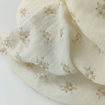 Double gauze 100% cotton beige roses on a vanilla background