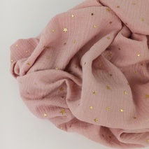Double gauze 100% cotton gold stars on a dusty pink background