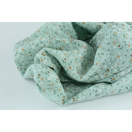 Double gauze 100% cotton, meadow on a powder mint background