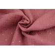 Double gauze 100% cotton golden marks on a dark pink background