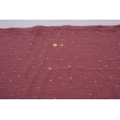 Double gauze 100% cotton golden marks on a dark pink background