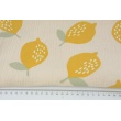 Double gauze, muslin 100% cotton large lemons on a beige background