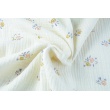 Double gauze 100% cotton, salmon-mustard flowers on a vanilla background