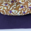 Double gauze 100% cotton, caramel and purple pattern on a vanilla background