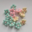 Button flower, pastel yellow