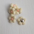 Button flower, pastel yellow