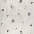 Organic cotton muslin with flowers on a natural background