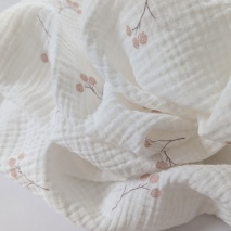 Double gauze 100% cotton, beige raspberries on a cream background