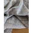 100% cotton, grey leaves on a cream background