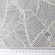 100% cotton, grey leaves on a cream background