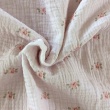 Double gauze 100% cotton brick flowers on a vanilla background