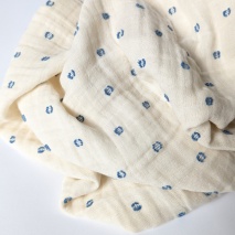 Double gauze cotton muslin, blue dots on cream
