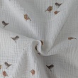 Cotton muslin, caramel birds on a cream background