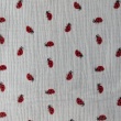 Double gauze 100% cotton, ladybugs on a cream background