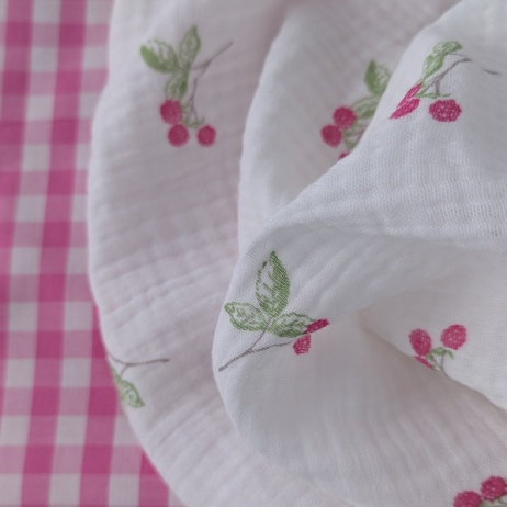Double gauze 100% cotton, pink blackberries on a cream background