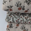 Double-sided quilted cotton muslin – orange flowers