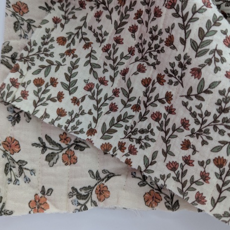 Double-sided quilted cotton muslin – orange flowers
