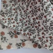 Double-sided quilted cotton muslin – orange flowers
