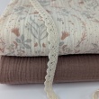 Double gauze 100% cotton, bunnies, birds, and flowers on a vanilla background
