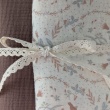 Double gauze 100% cotton, bunnies, birds, and flowers on a vanilla background