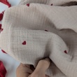 Double gauze 100% cotton, red hearts on a beige background