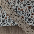 Cotton muslin, caramel and gray flowers on an ecru background