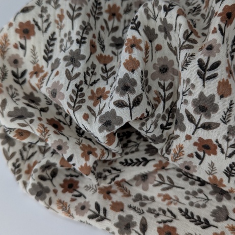 Cotton muslin, caramel and gray flowers on an ecru background